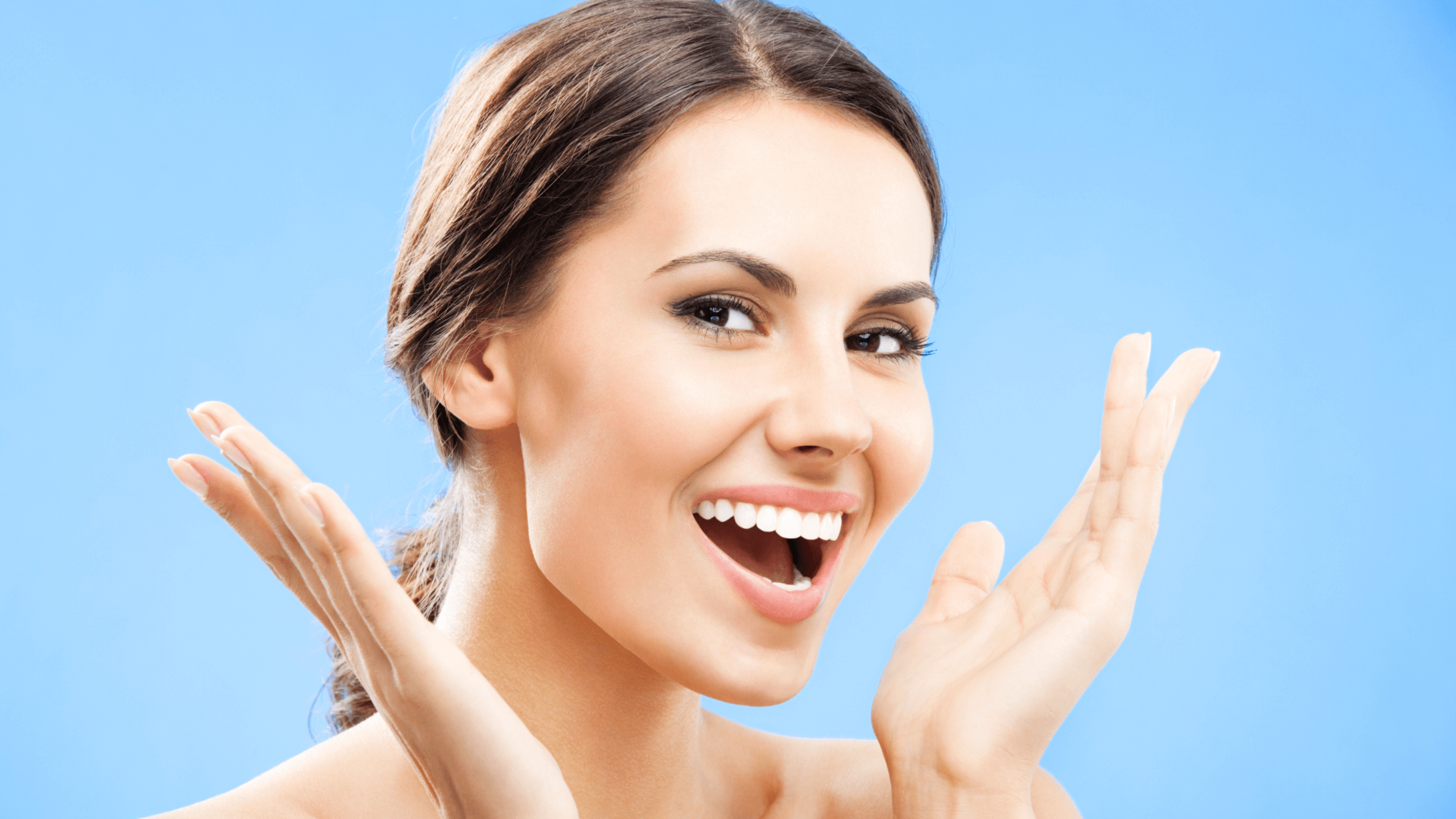 woman with glowing face smilin